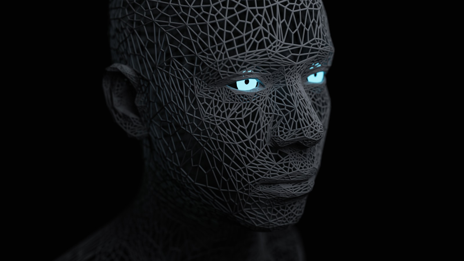 A 3D wireframe render of a human face with glowing eyes on a black background, representing facial recognition